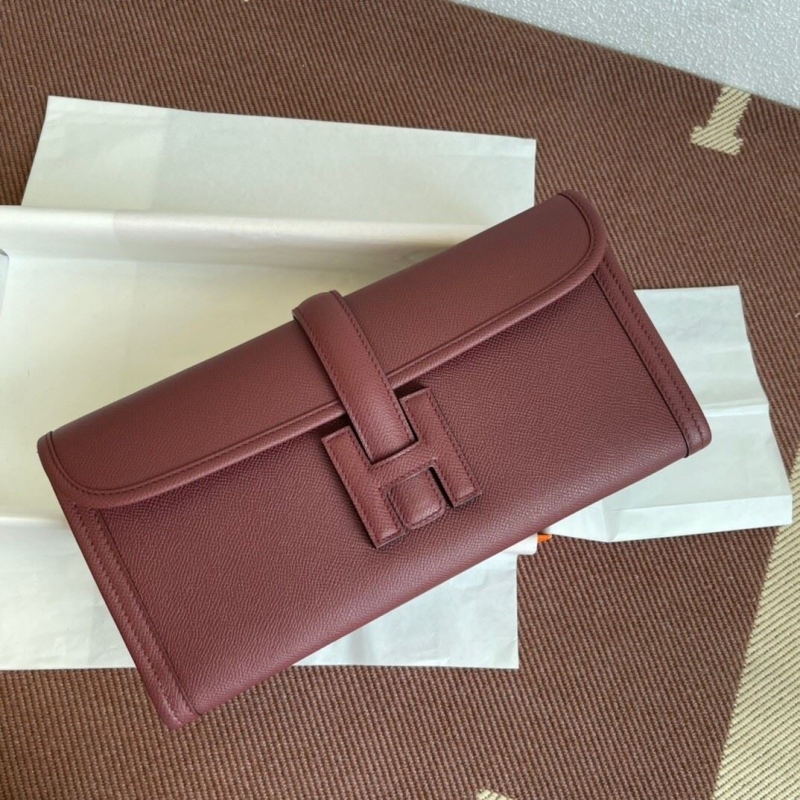 H**mes clutch bags